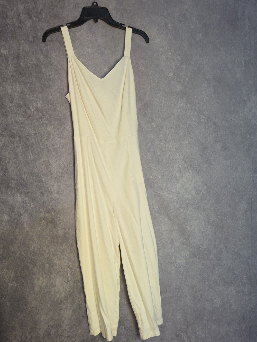 Limited Sleeveless White Jumpsuit with V-Neck And Belt Tie